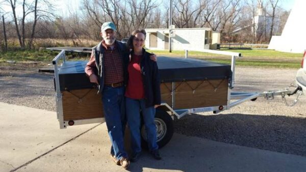 Couple with canoe trailer