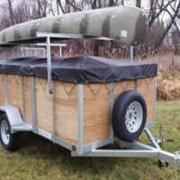 6x12 utility trailer with cover and canoe on top