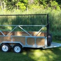Custom canoe trailer with metal and wood